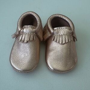 Freshly Picked Baby girl’s Shimmering Gold Kids Moccasins.  Size 3.